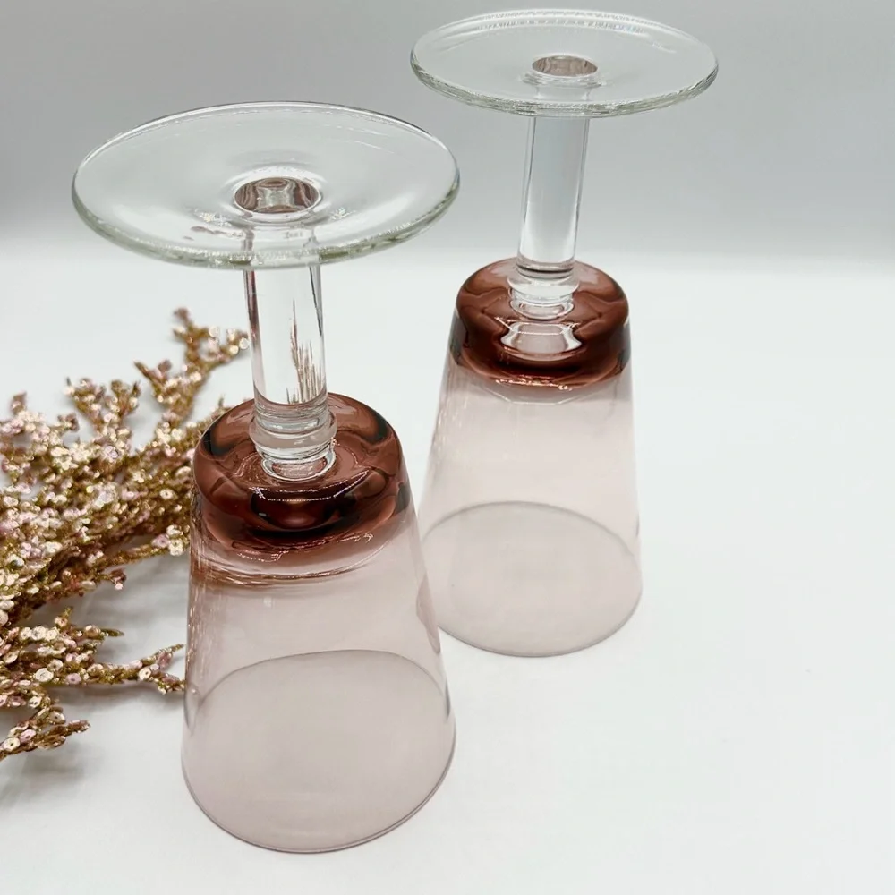 2 Crate & Barrel Amethyst Glasses. Bit of Pink and Purple Tones